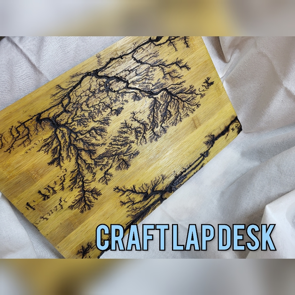 Custom electric burn, lap table.